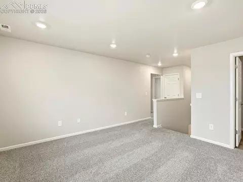 Living - 13326 Valley Peak Dr, Peyton, CO 80831 photo 2 of 4