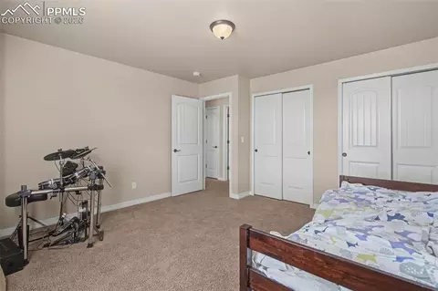 Bedroom - 12686 Culebra Peak Dr, Peyton, CO 80831 photo 7 of 9