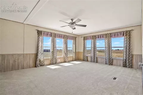 Living - 22280 Jones Rd, Peyton, CO 80831 photo 4 of 5