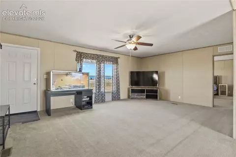 Living - 22280 Jones Rd, Peyton, CO 80831 photo 3 of 5
