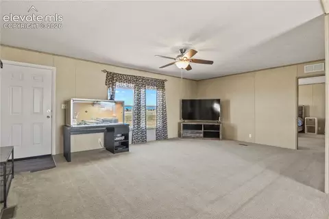 Living - 22280 Jones Rd, Peyton, CO 80831 photo 3 of 5