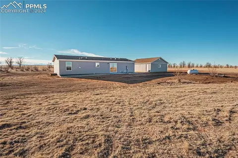Exterior - 5717 Sengbeil Rd, Yoder, CO 80864 photo 5 of 11