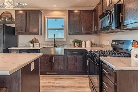Kitchen - 5717 Sengbeil Rd, Yoder, CO 80864 photo 5 of 6