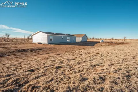 Exterior - 5717 Sengbeil Rd, Yoder, CO 80864 photo 4 of 11
