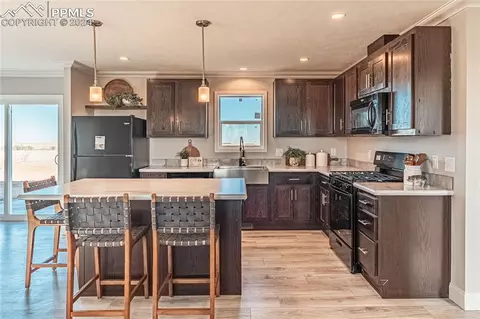 Kitchen - 5717 Sengbeil Rd, Yoder, CO 80864 photo 4 of 6
