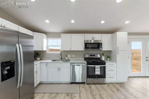 Kitchen - 6190 Night Train Ln, Yoder, CO 80864 photo 2 of 3