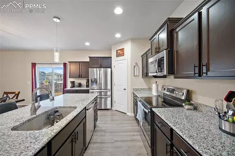 Kitchen - 7702 Berwyn Loop, Peyton, CO 80831 photo 2 of 3