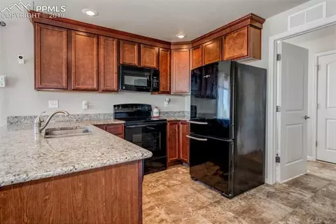 11669 Shaolin Grv, Peyton, CO 80831 photo 11
