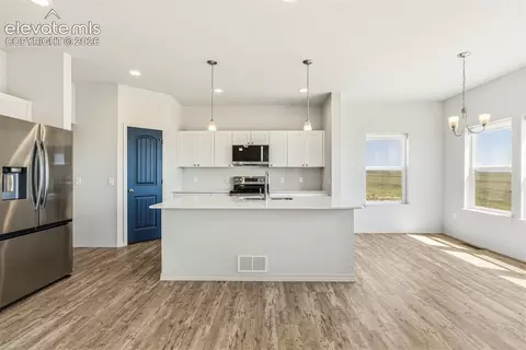 Kitchen - 3955 N Yoder Rd, Yoder, CO 80864 photo 2 of 3