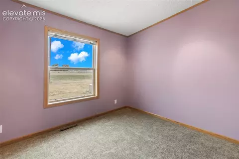 Bedroom - 1350 S Calhan Hwy, Yoder, CO 80864 photo 6 of 10