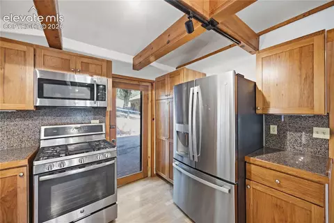 Kitchen - 9795 Mountain Rd, Cascade, CO 80809 photo 5 of 5