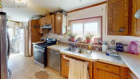 Kitchen - 49800 E 112th Ave, Bennett, CO 80102 photo 1 of 2