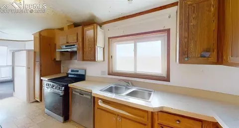 Kitchen - 49800 E 112th Ave, Bennett, CO 80102 photo 2 of 2