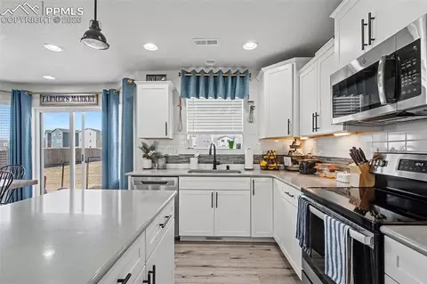 Kitchen - 7811 Berwyn Loop, Peyton, CO 80831 photo 5 of 5