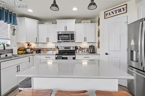 Kitchen - 7811 Berwyn Loop, Peyton, CO 80831 photo 3 of 5