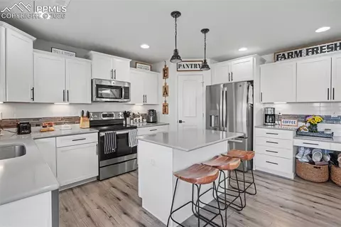 Kitchen - 7811 Berwyn Loop, Peyton, CO 80831 photo 4 of 5