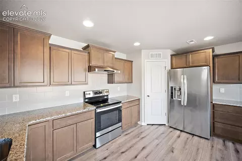 Kitchen - 7701 Berwyn Loop, Peyton, CO 80831 photo 2 of 2