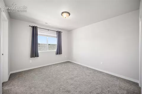 Bedroom - 7701 Berwyn Loop, Peyton, CO 80831 photo 3 of 4