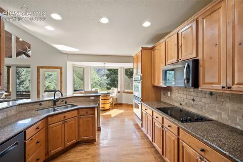 Kitchen - 8515 Aspenglow Ln, Cascade, CO 80809 photo 1 of 2