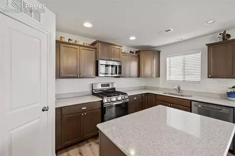 Kitchen - 8151 Berwyn Loop, Peyton, CO 80831 photo 3 of 5