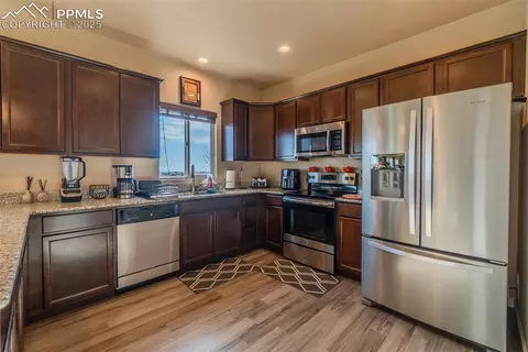Kitchen - 7514 Teocalli Pt, Peyton, CO 80831 photo 2 of 3