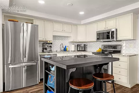 Kitchen - 313 Raspberry Ln, Monument, CO 80132 photo 2 of 3