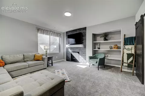 Living - 12637 Clark Peak Ct, Peyton, CO 80831 photo 2 of 2