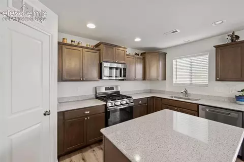 Kitchen - 8151 Berwyn Loop, Peyton, CO 80831 photo 5 of 7