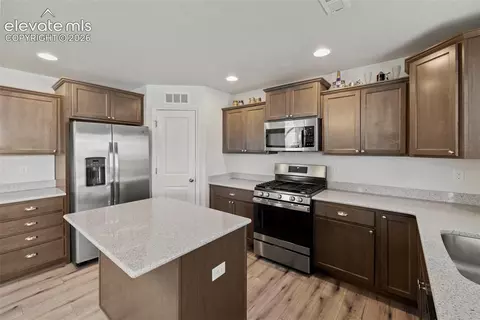 Kitchen - 8151 Berwyn Loop, Peyton, CO 80831 photo 3 of 7