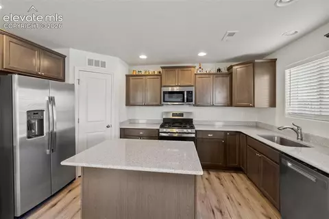 Kitchen - 8151 Berwyn Loop, Peyton, CO 80831 photo 4 of 7