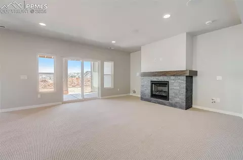 Living - 4707 Mountain Ledge Ln, Monument, CO 80132 photo 9 of 11