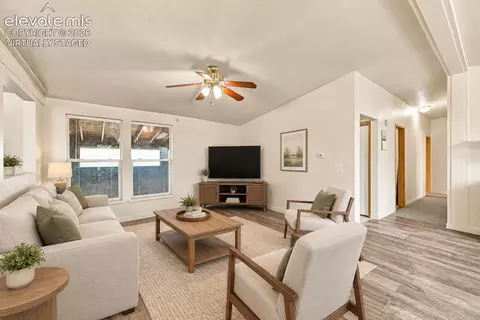 Living - 1497 County Rd S, Rush, CO 80833 photo 3 of 4