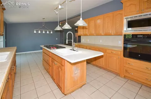 Kitchen - 34115 Big Springs Rd, Yoder, CO 80864 photo 3 of 4