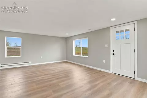 Living - 10672 Boone Rd, Yoder, CO 80864 photo 3 of 7