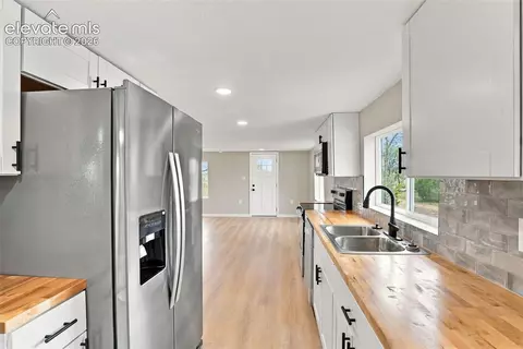 Kitchen - 10672 Boone Rd, Yoder, CO 80864 photo 4 of 6