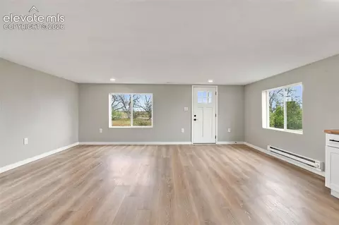 Living - 10672 Boone Rd, Yoder, CO 80864 photo 4 of 7