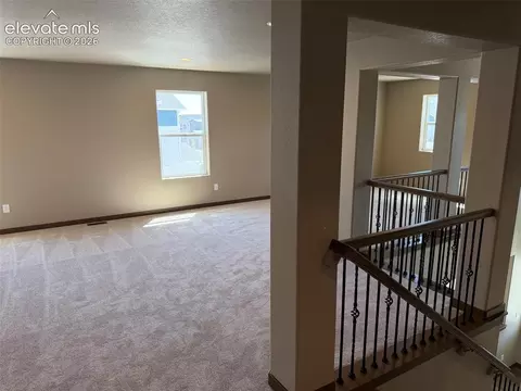 Living - 10895 Evening Creek Dr, Peyton, CO 80831 photo 2 of 6