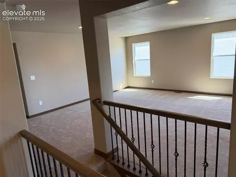 Living - 10895 Evening Creek Dr, Peyton, CO 80831 photo 4 of 6