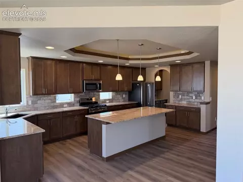 Kitchen - 10895 Evening Creek Dr, Peyton, CO 80831 photo 2 of 2