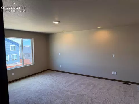 Living - 10895 Evening Creek Dr, Peyton, CO 80831 photo 5 of 6
