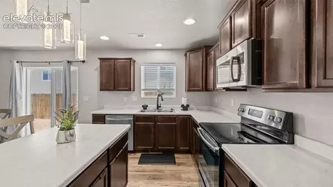 Kitchen - 7714 Cruzer Hts, Peyton, CO 80831 photo 4 of 4