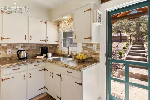 Kitchen - 9120 Ute Rd, Cascade, CO 80809 photo 1 of 3