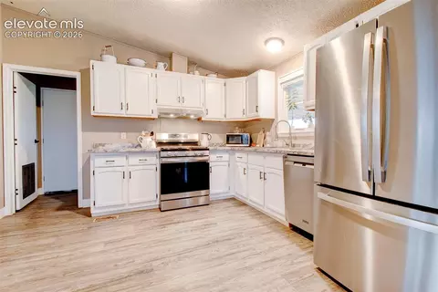 Kitchen - 30255 Antioch Rd, Yoder, CO 80864 photo 1 of 2