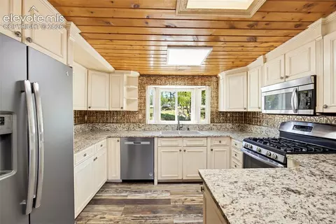 Kitchen - 33511 Nova Rd, Pine, CO 80470 photo 7 of 8