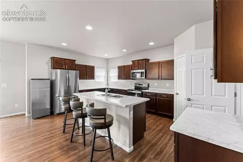 Kitchen - 10054 Exeter Trl, Peyton, CO 80831 photo 3 of 7