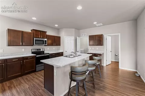 Kitchen - 10054 Exeter Trl, Peyton, CO 80831 photo 5 of 7