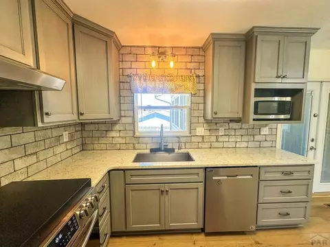Kitchen - 407 Conifer Cir, Lamar, CO 81052 photo 2 of 3