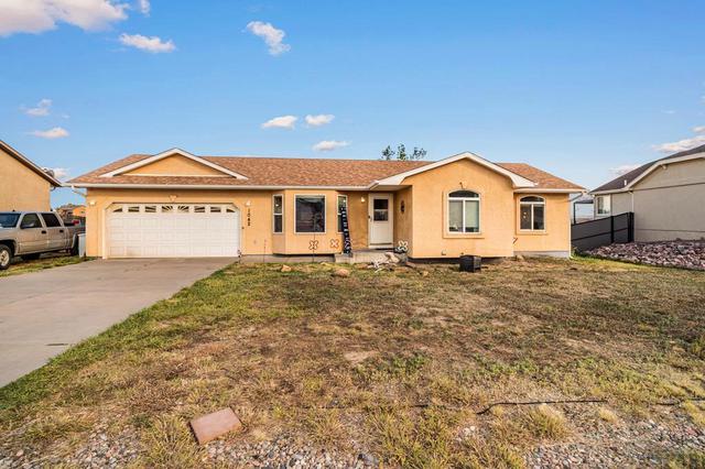 1042 S Honeysuckle Dr, Pueblo West, CO 81007