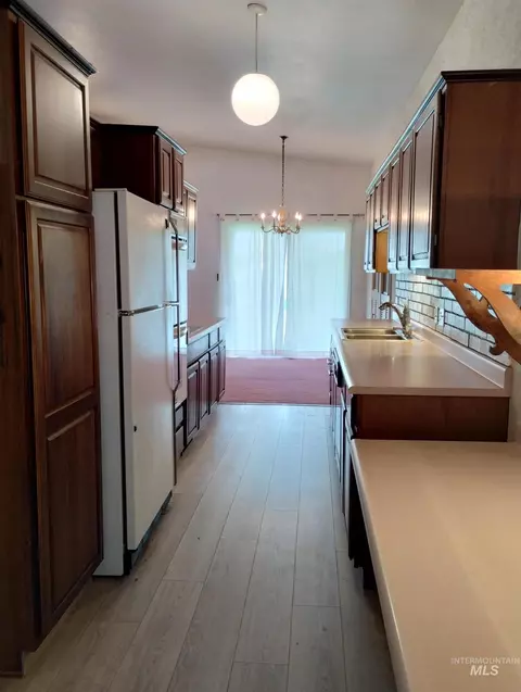 Kitchen - 1298 E 2nd St, Weiser, ID 83672 photo 2 of 3