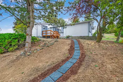 Exterior - 128 E Persimmon St, Genesee, ID 83832 photo 9 of 11